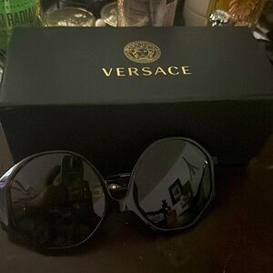 Never used, new whit box, Versace color black.